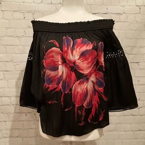 Jennifer Lopez Flowy off the shoulder blouse: